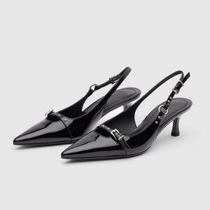 Black sling back kitten heel